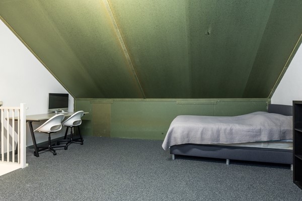 Foto - Te koop: In Landgraaf op een zeer kindvriendelijke locatie bevindt zich deze nette en moderne instapklare energiezuinige tussenwoning uit 2008